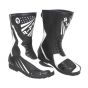 Bottes de moto noires et blanches