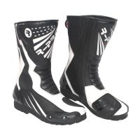 Bottes de moto noires et blanches