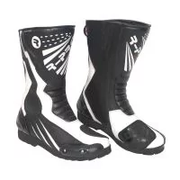 Bottes de moto noires et blanches